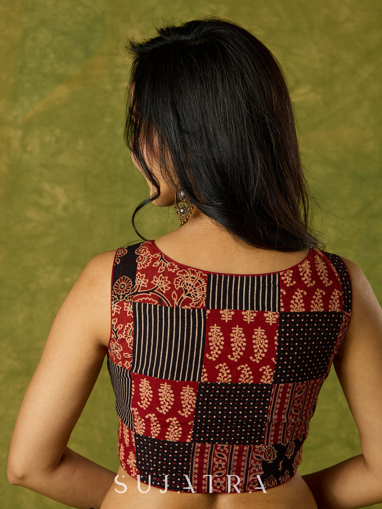 Contemporary sleeveless patchwork blouse