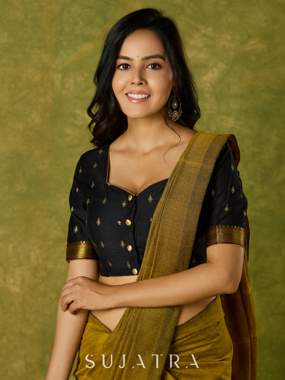 Festive charm in black self-butti cotton silk blouse.