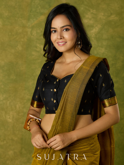 Festive charm in black self-butti cotton silk blouse.