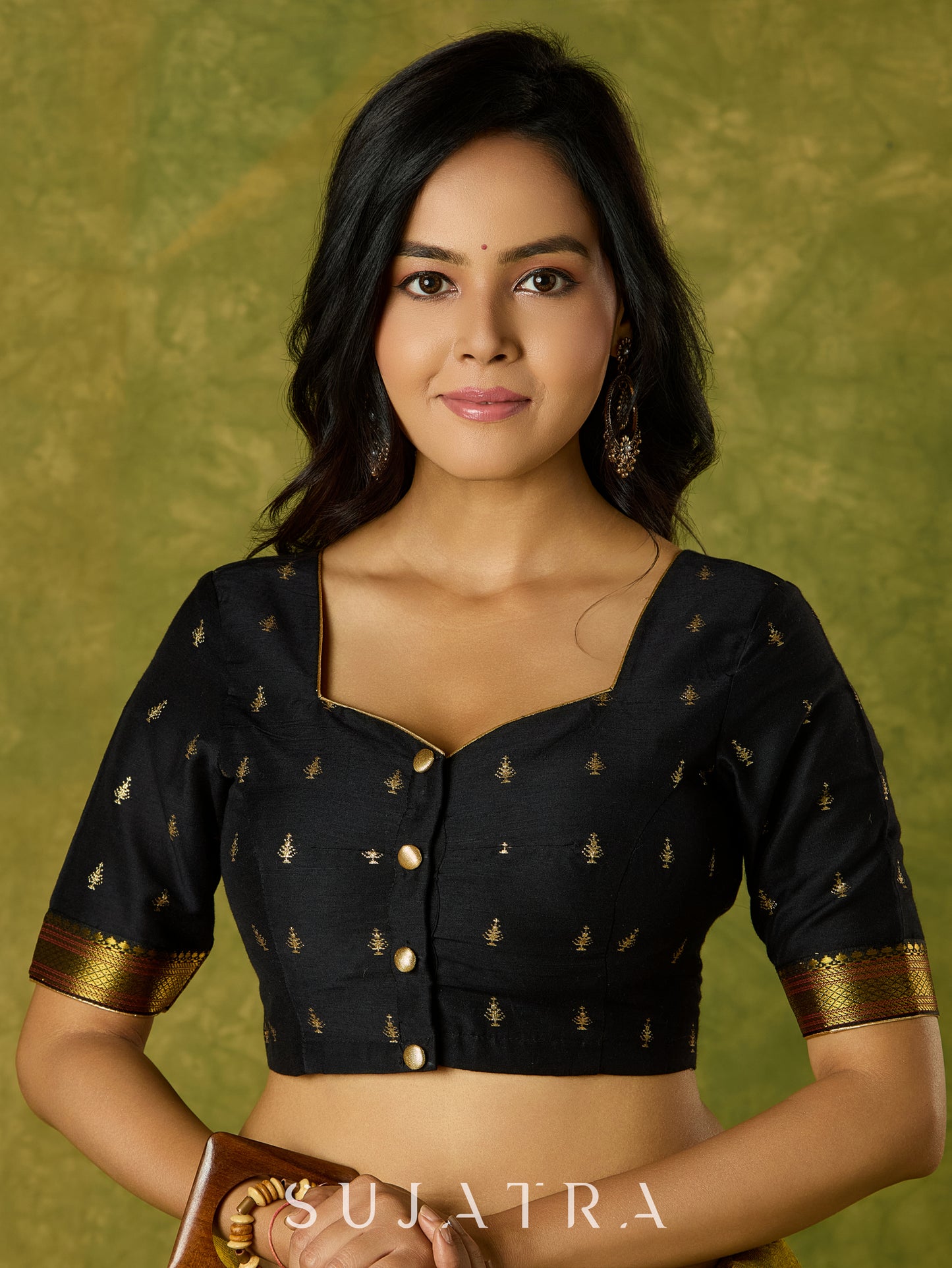 Festive charm in black self-butti cotton silk blouse.