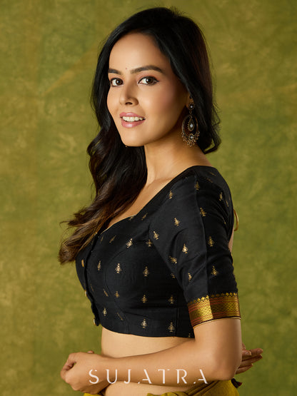 Festive charm in black self-butti cotton silk blouse.