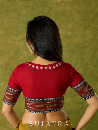 Beautiful hand-painted maroon cotton blouse with striking ikat fabric combination.