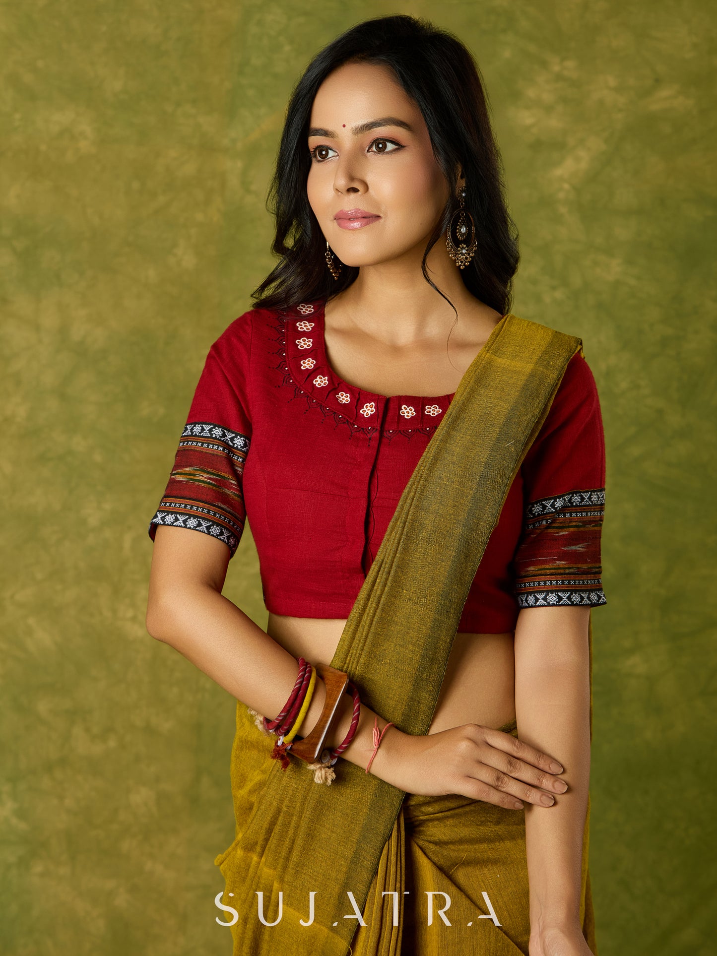 Beautiful hand-painted maroon cotton blouse with striking ikat fabric combination.