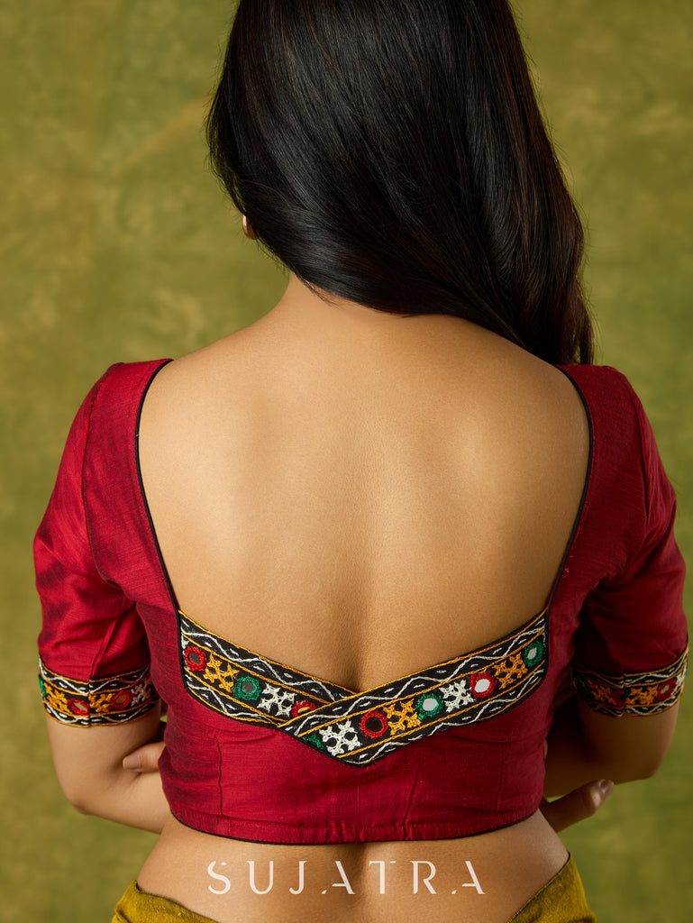 Rich maroon cotton blouse with intricate Kutch mirror embroidery