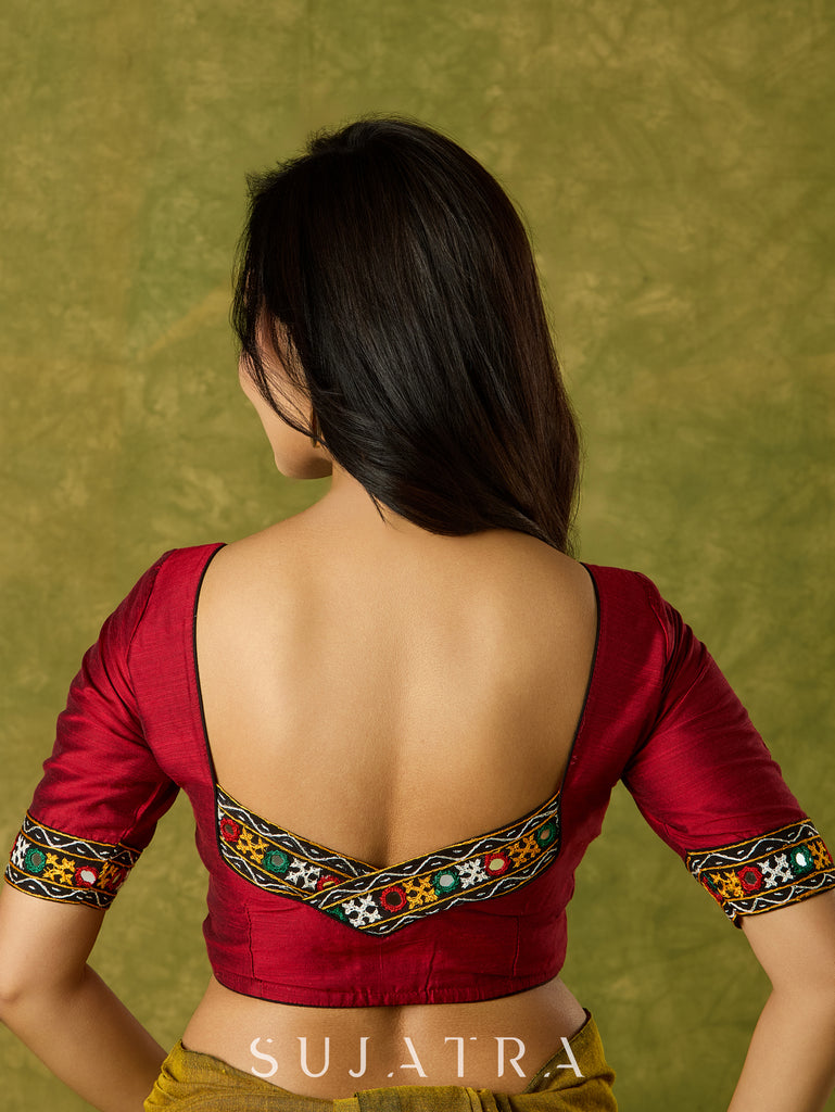Rich maroon cotton blouse with intricate Kutch mirror embroidery