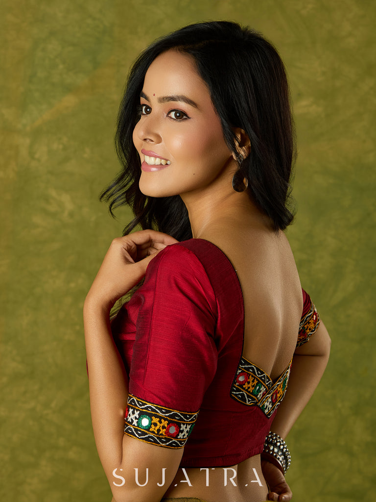 Rich maroon cotton blouse with intricate Kutch mirror embroidery