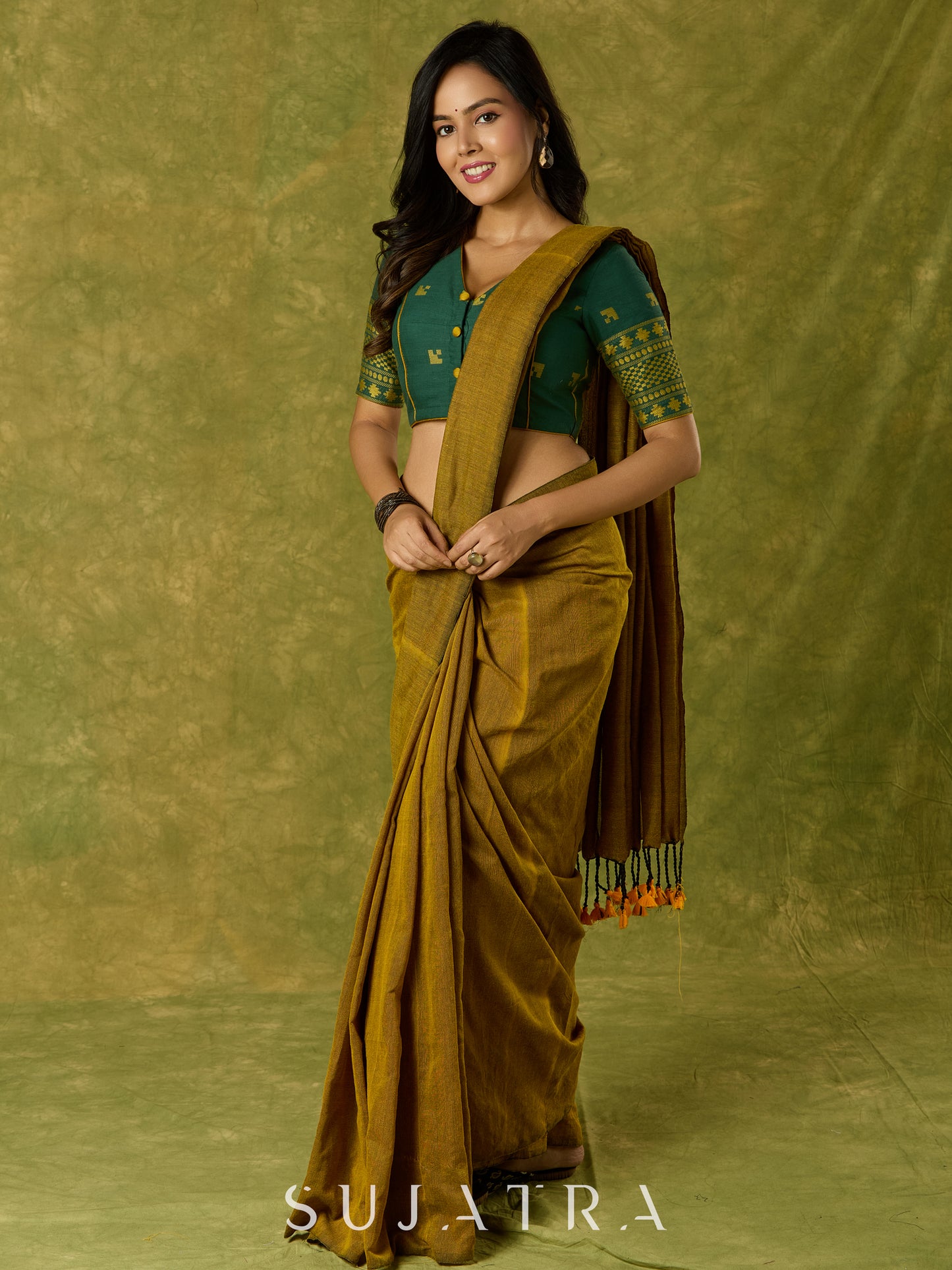 Festive green Jamdani cotton blouse with elegant woven detailing