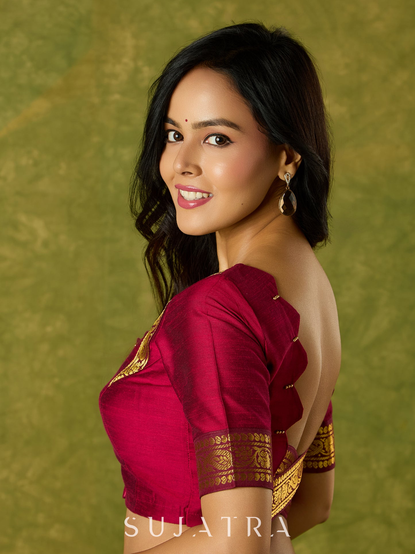 Dark magenta festive blouse with delicate lace highlights.