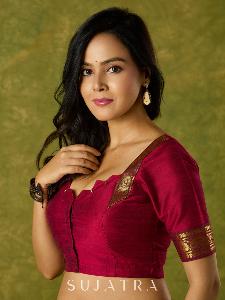 Dark magenta festive blouse with delicate lace highlights.