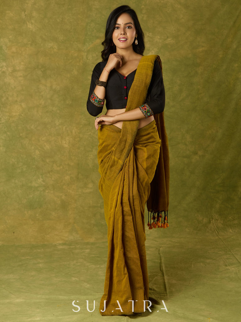 Black cotton silk blouse with intricate Kutch mirror work.