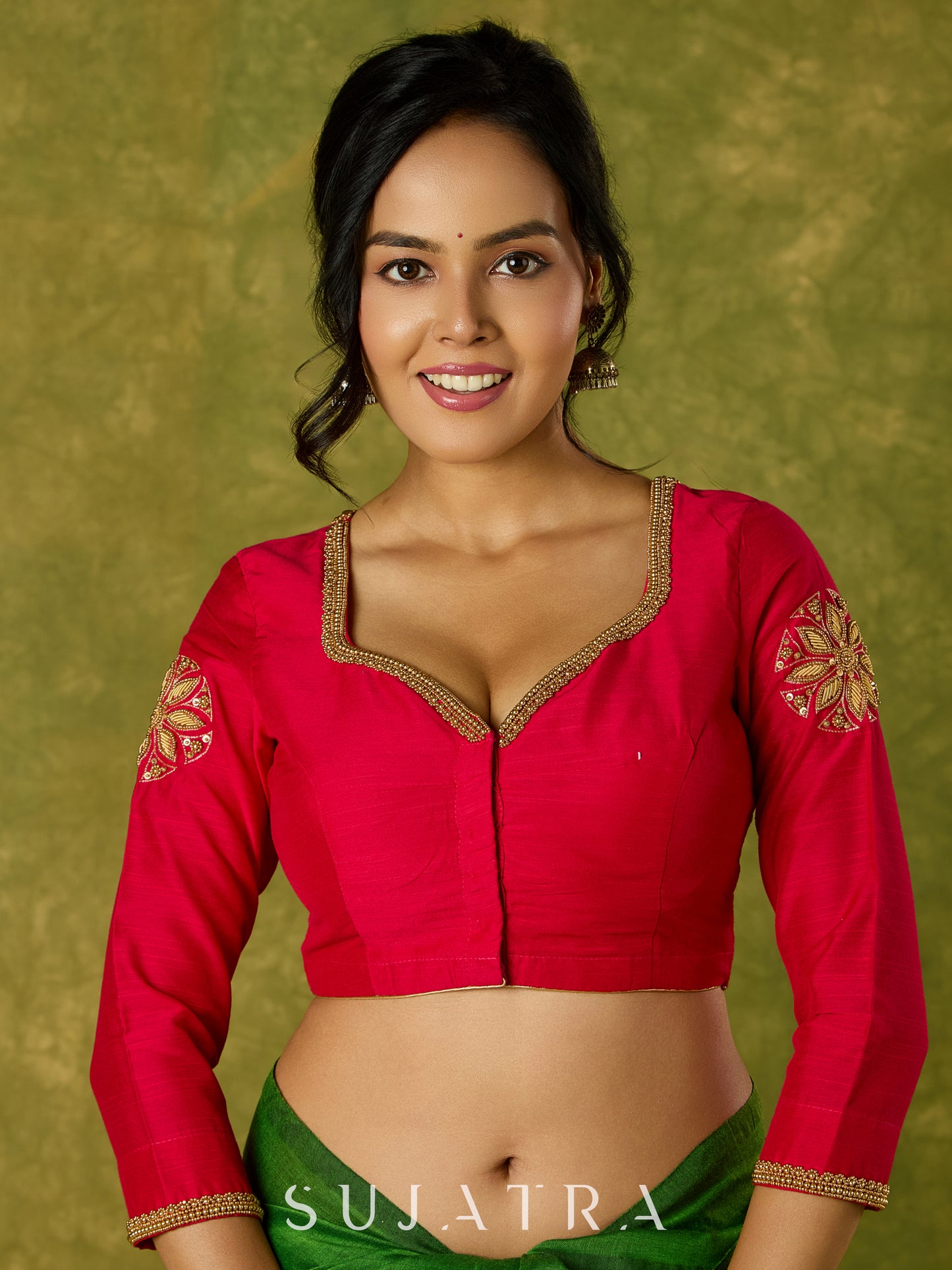 Elegant hand embroidered dark pink cotton silk blouse with intricate detailing.