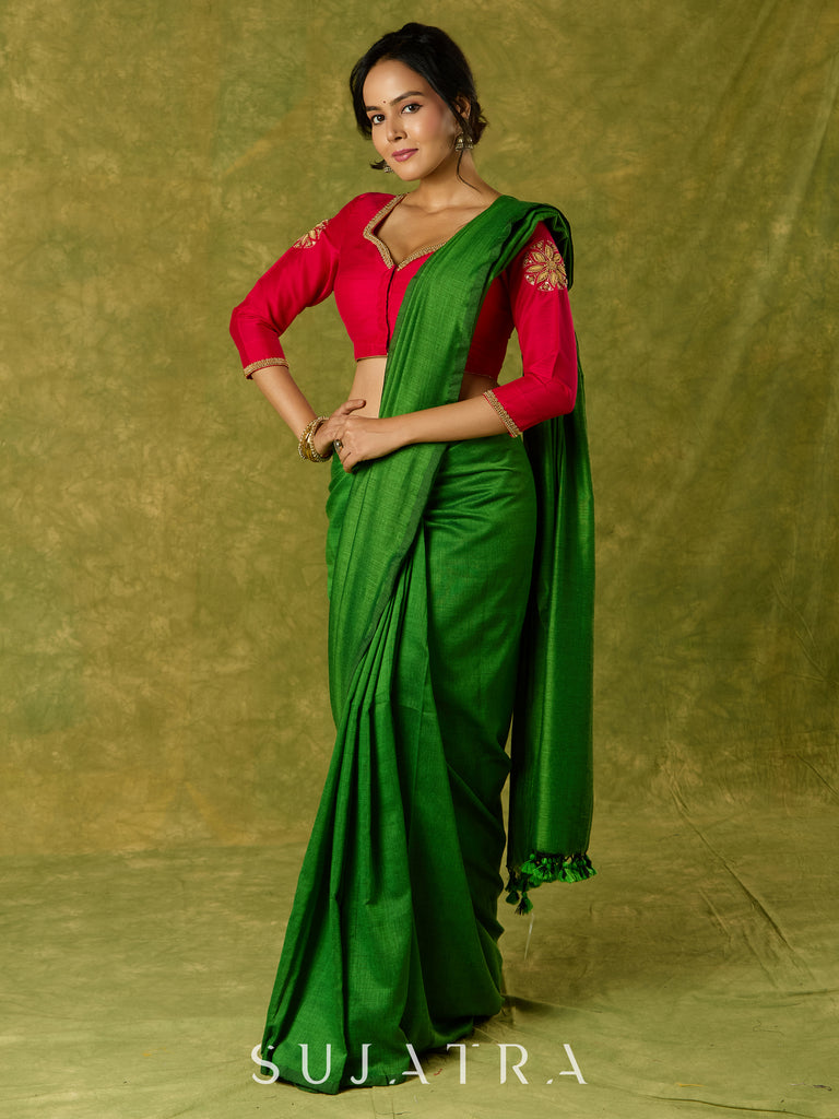 Elegant hand embroidered dark pink cotton silk blouse with intricate detailing.