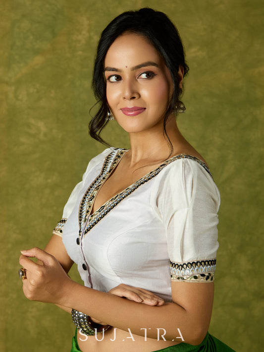 Elegant white Chanderi blouse with V-neck and lace highlights