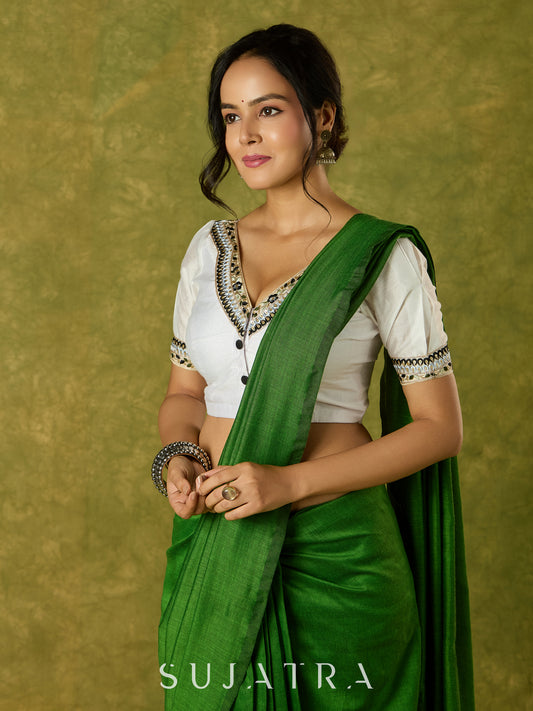 Elegant white Chanderi blouse with V-neck and lace highlights