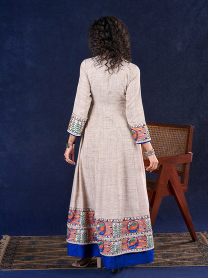 Artisanal Beige Handloom Cotton Angarkha Long Gown with Madhubani Border Embellished Neckline, Sleeve & Flare, with Vibrant Statement Tassels