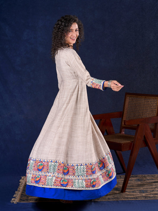 Artisanal Beige Handloom Cotton Angarkha Long Gown with Madhubani Border Embellished Neckline, Sleeve & Flare, with Vibrant Statement Tassels