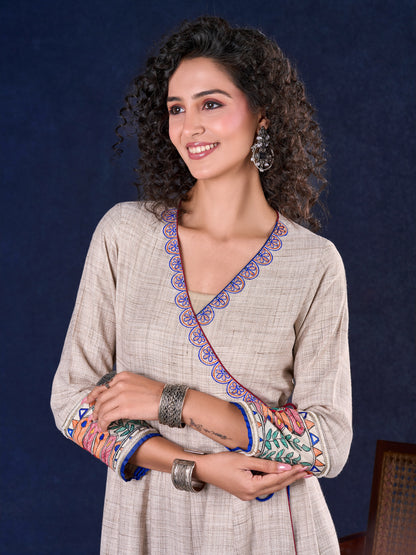 Artisanal Beige Handloom Cotton Angarkha Long Gown with Madhubani Border Embellished Neckline, Sleeve & Flare, with Vibrant Statement Tassels