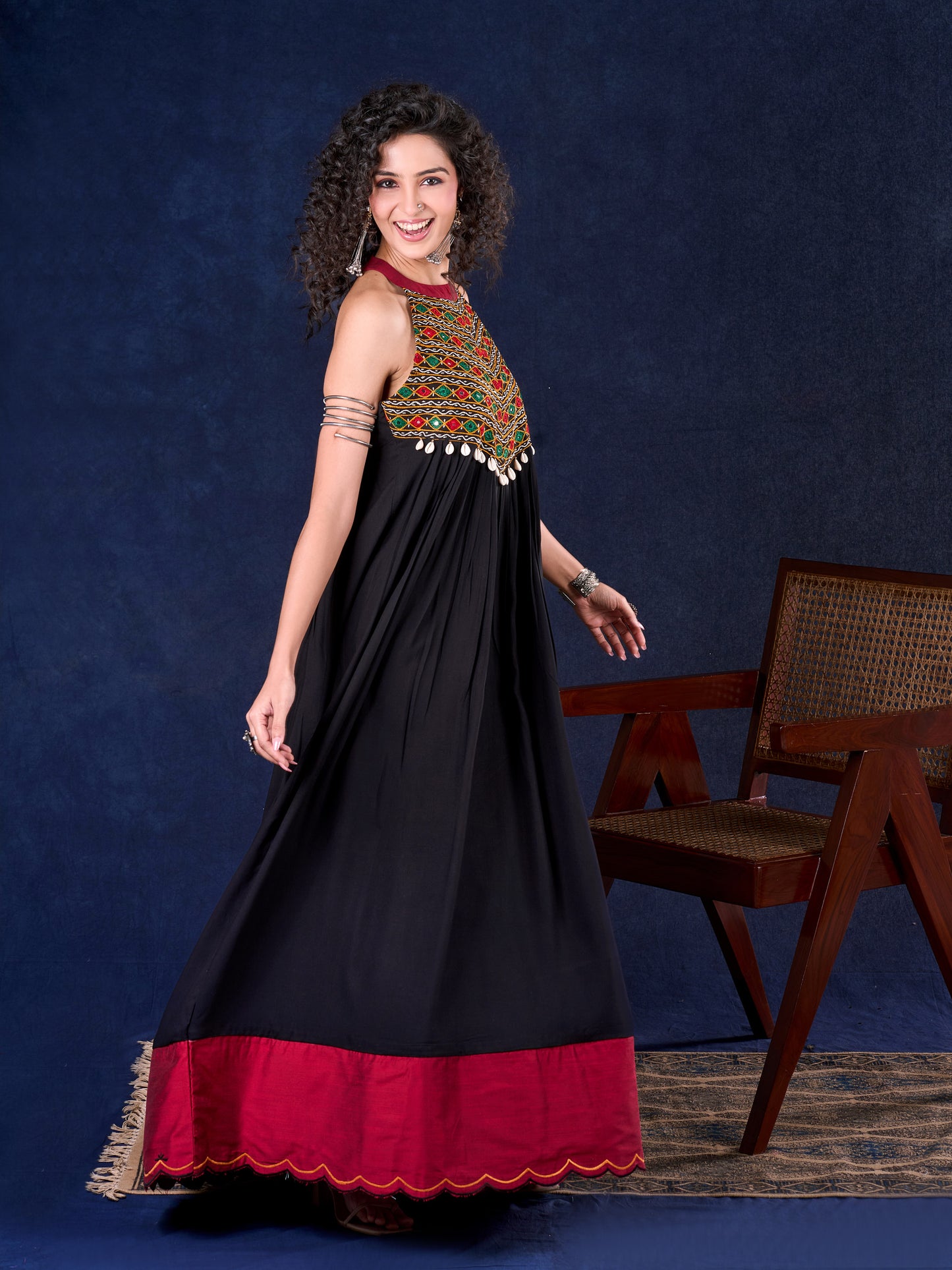 Elegant Black Rayon Halter Neck Long Gown with Mirror Work & Cowrie Shell Embellishments