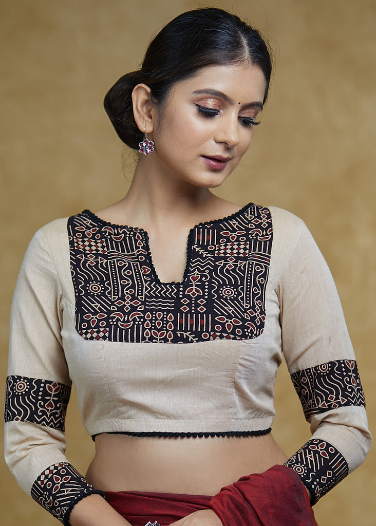 Smart Cream Blouse with Black Ajrakh yoke & Sleeves Highlighted with Black pom-pom Lace