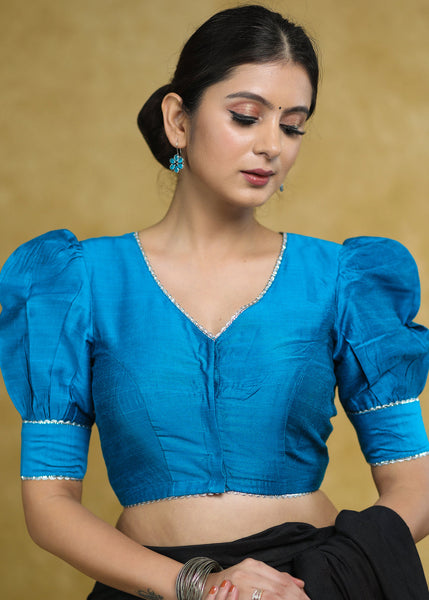 Striking Firozi Blue Puff Sleeves Elbow Length Blouse with Silver Detailing