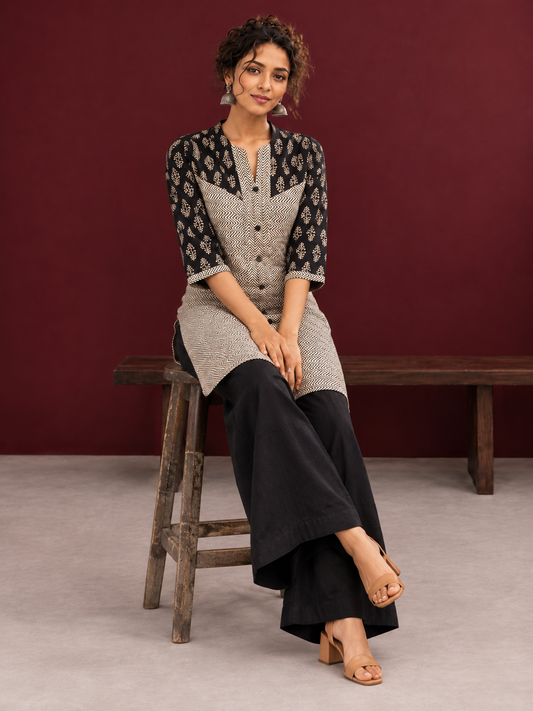 Elegant Black & Beige Cotton Tunic with Chevron Print Body and Floral Block Print Yoke & Sleeves — seated