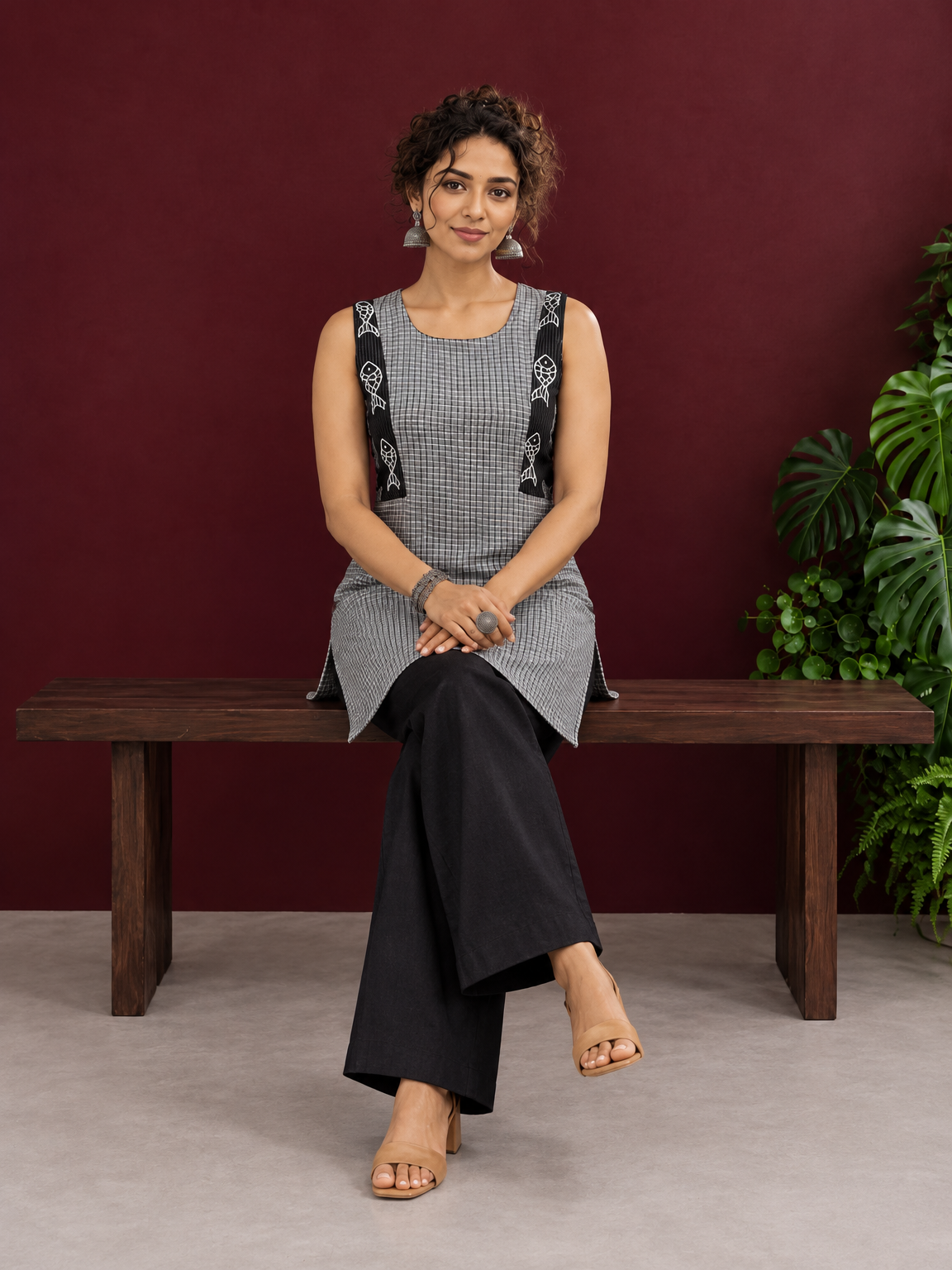 Grey Checked Cotton Kurta with Black Embroidered Fish Motif Shoulder Straps & Side Slits — seated — view 2