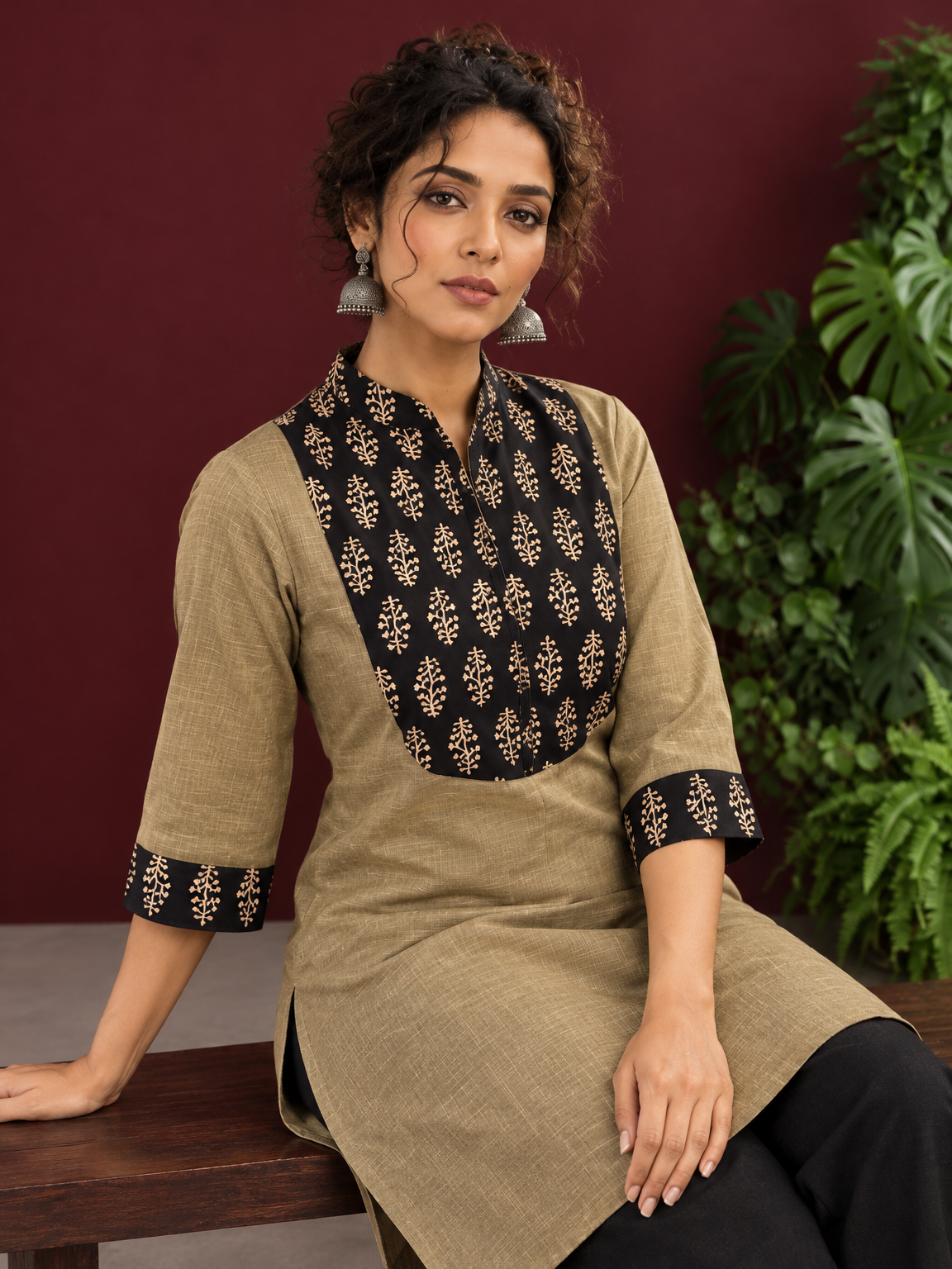 Classic Beige Cotton Kurta with Contrast Black Floral Print Yoke & Coordinated Sleeve Cuffs — seated detail — view 7