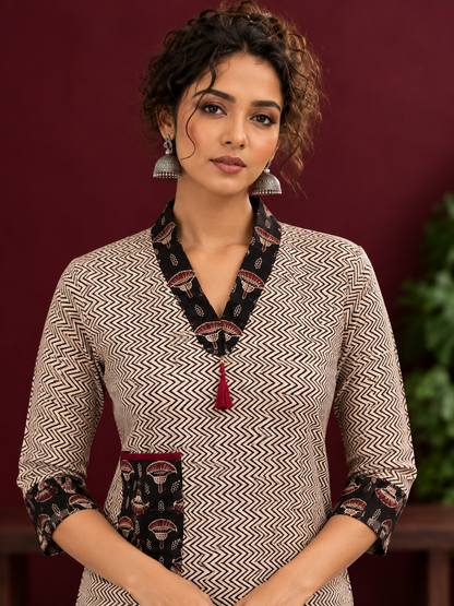 Elegant Beige Cotton Ajrakh Tunic with Contrast V-Neck & Cuff Detailing — fabric detail