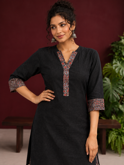 Timeless Black Cotton Tunic with Contrast Ajrakh Print V-Neck Placket & Coordinated Sleeve Cuffs — fabric detail