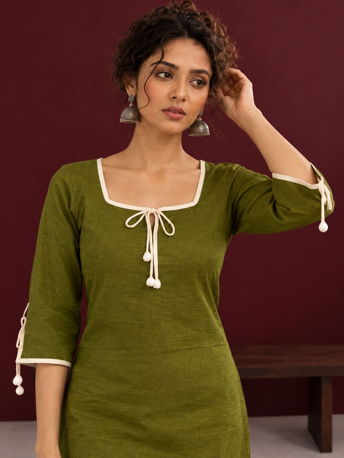 Timeless Olive Green Cotton Tunic with Tasseled Tie-Up Neckline and Contrast Lace Hem Border — styled view — view 5