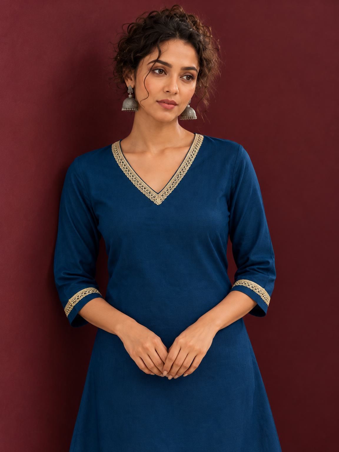 Elegant Teal Blue Cotton Tunic with Embellished Gold Lace V-Neckline and Matching Sleeve Cuffs — fabric detail — view 4
