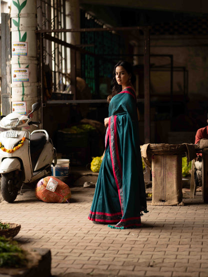 Ocean Turquoise Cotton Saree with Subtle Printed Border and Silk Pink Highlights
