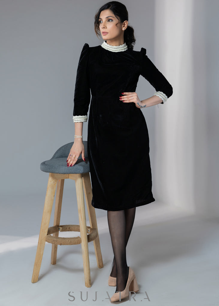Beautiful black velvet dress with off-white lace work on neck & sleeves