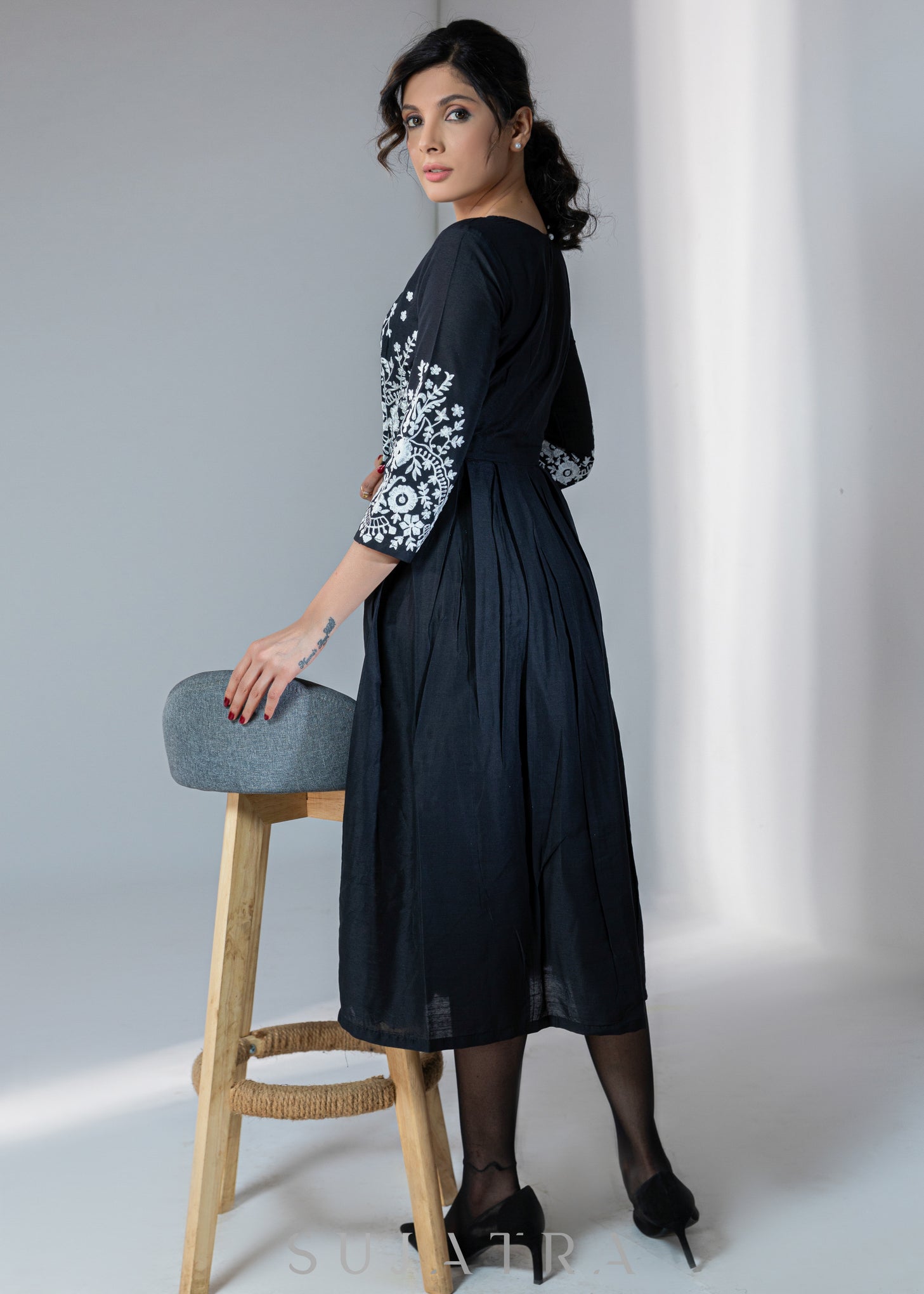 black dress with white embroidery Louisa in Exquisite Ruffles and Long Sleeves Long-Sleeve Embroidered Mini Swing Dress
