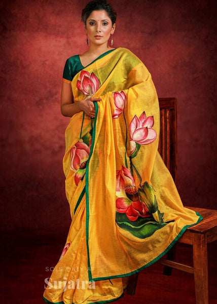 Hand painted yellow chanderi saree with exclusive floral motifs
