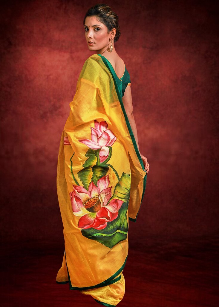 Hand painted yellow chanderi saree with exclusive floral motifs