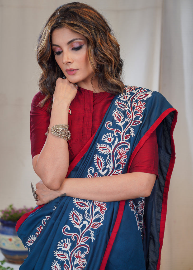 Teal exclusive machine embroidery Rayon saree with maroon border