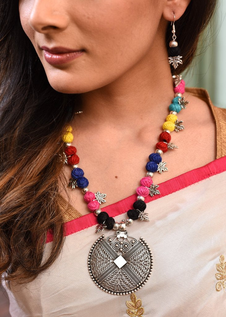 Exclusive multicolored necklace set with german silver pendant - Sujatra