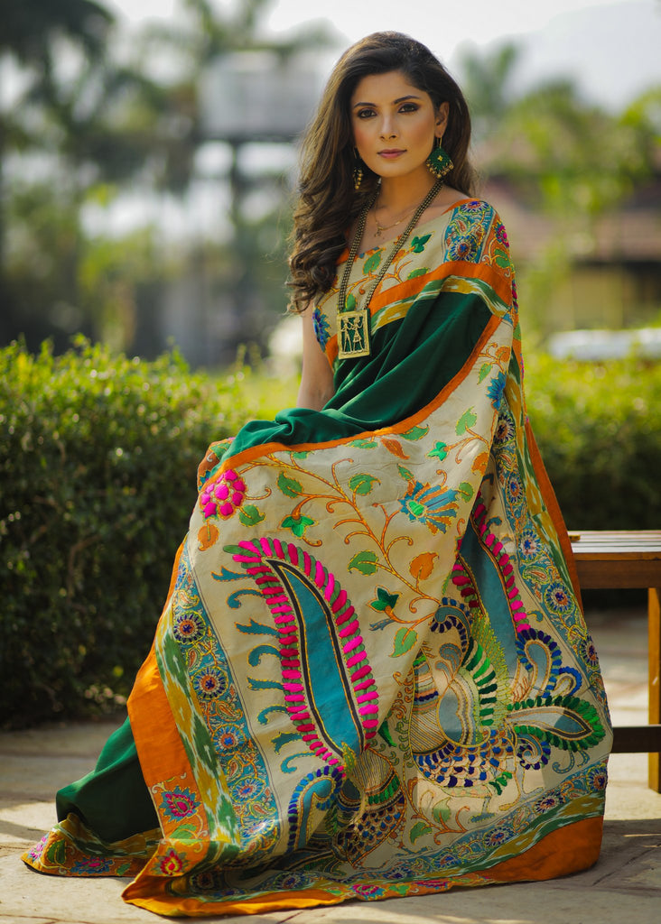 Dark green crepe satin saree with embroidered madhubani pallu