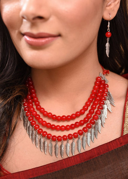 Exclusive red glass beaded necklace with feather pendant - Sujatra