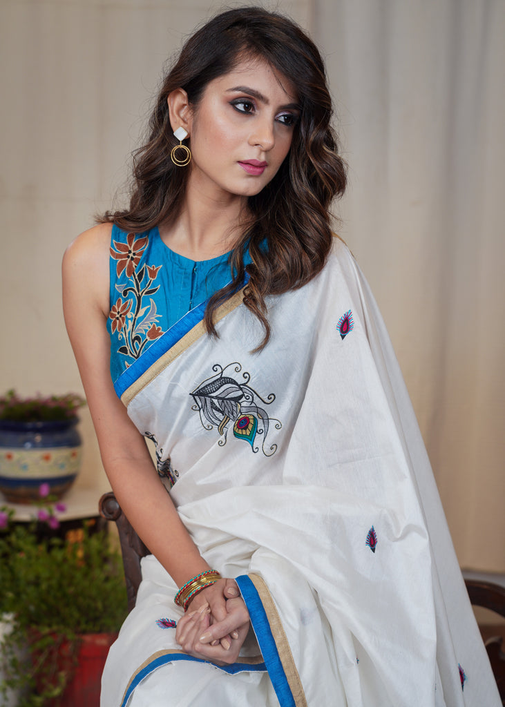 White cotton saree with beautiful peacock feather motif