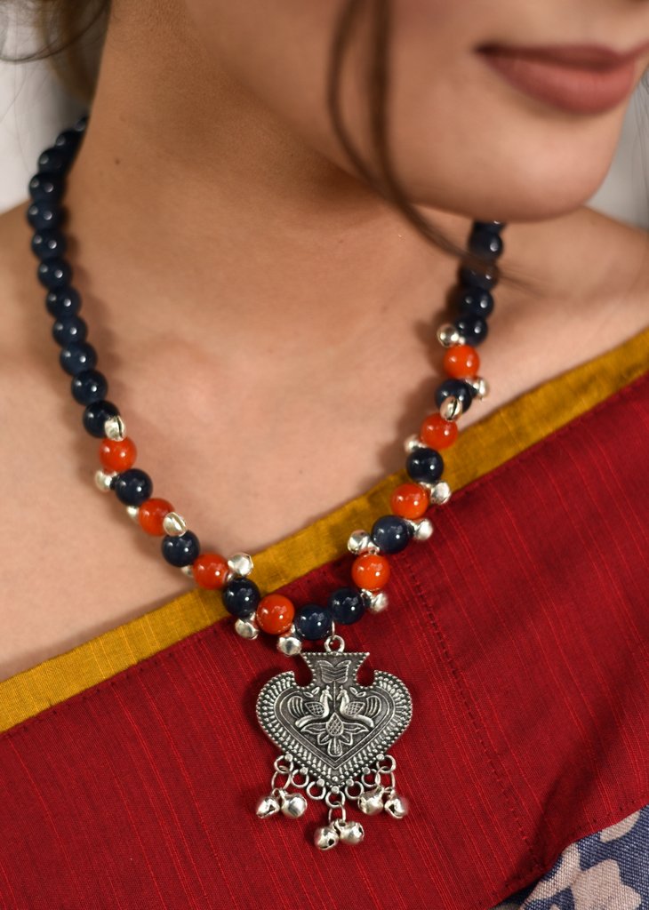 Exclusive glass bead necklace with german silver pendant & ghungroo tassel - Sujatra
