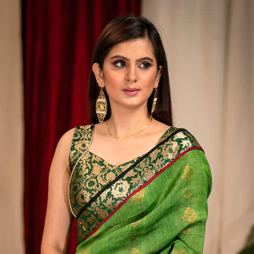 Beautiful Bottle green sleeveless banarasi blouse