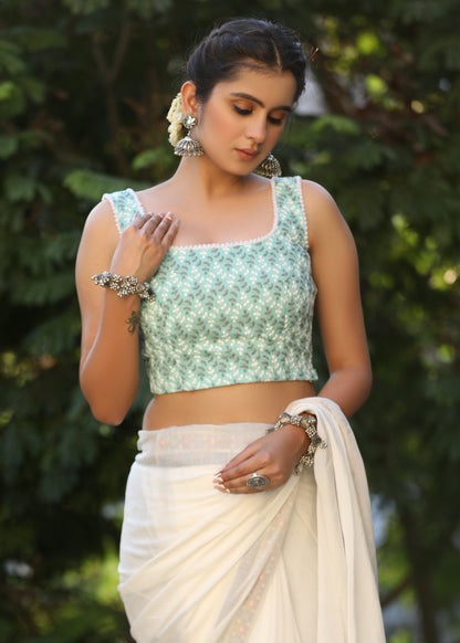Turquoise Chikankari Sleeveless Blouse with Pompom Lace Detailing