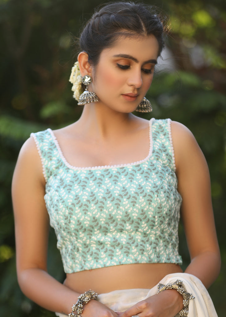 Turquoise Chikankari Sleeveless Blouse with Pompom Lace Detailing