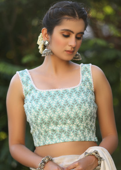 Turquoise Chikankari Sleeveless Blouse with Pompom Lace Detailing