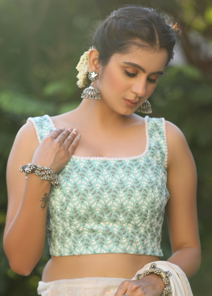 Turquoise Chikankari Sleeveless Blouse with Pompom Lace Detailing