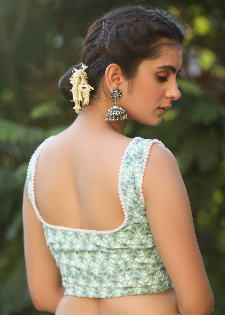 Turquoise Chikankari Sleeveless Blouse with Pompom Lace Detailing