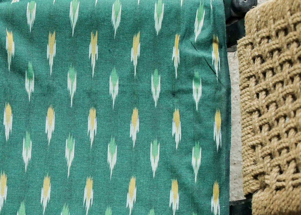 Pure Ikat Cotton Fabric in Bottle Green Colour