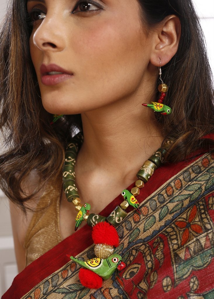 Fern green wooden handcrafted beads necklace set combined beautifully with parrot pendant - Sujatra